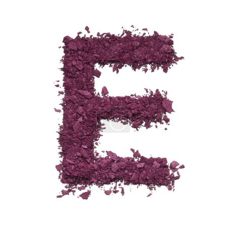 Photo for Stencil capital letter made by burgundy crushed eye shadow or broken powder isolated on white background. - Royalty Free Image