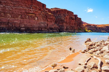 Photo for Lees Ferry in the USA - the famous ferry crossing the Colorado River and the Grand Canyon in Arizona.  The water of the Colorado River reflects the surrounding colored rocks. Lovely warm sunny day. - Royalty Free Image