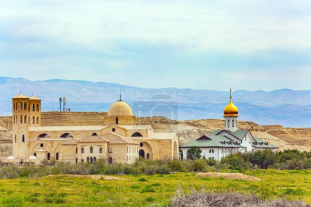 Photo for Gilded dome of the church with an Orthodox cross. Religious buildings on the Israeli coast. Qasr el Yahud. Place of the Baptism of Jesus Christ on Jordan River in Israel - Bethabara. - Royalty Free Image