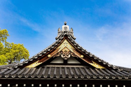 Photo for Temple roof. Decor element. "Flower Temple" by Kameido Tenjin. The temple is dedicated to the politician Sugawara no Michizane, the patron saint of students. - Royalty Free Image