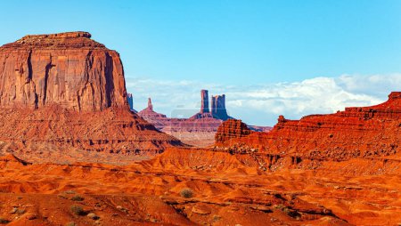 Photo for Mitchell Mesa. Monument Valley. USA. Navajo Indian Reservations. The Colorado Plateau is made up of picturesque bright red sandstone. - Royalty Free Image