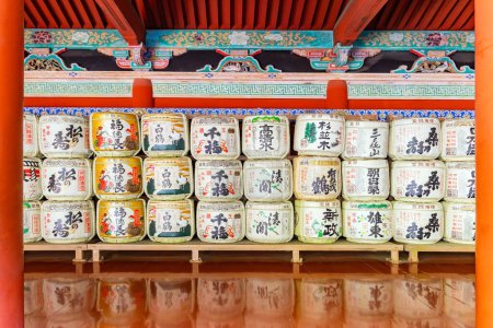 Photo for Sake vault is a traditional Japanese alcoholic drink. Drinking a cup of sake in the temple meant an act of unity with higher powers. The temple and shrine of Nikko Tosho-gu - Royalty Free Image