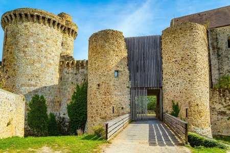 Watch round towers. The main entrance to the feudal estates. The Chateau de la Madeleine in Chevreuse. France. Chevreuse valley