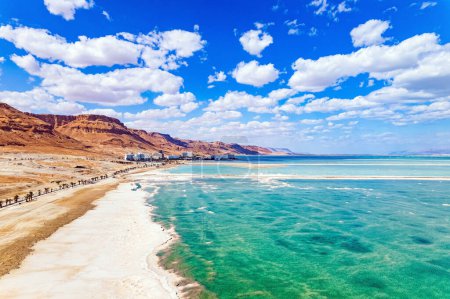 The picturesque embankment. Israel. The saltiest body of water in the world. The Dead Sea is a magnificent international resort for treatment and relaxation. Filming from a drone.