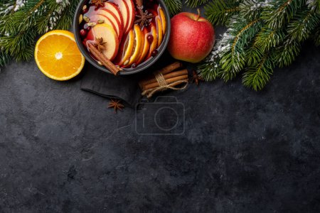 Photo for Hot mulled wine with fruits and spices. Flat lay with copy space - Royalty Free Image