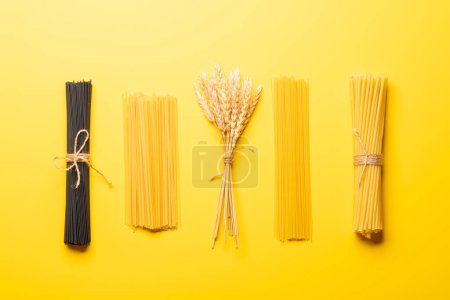 Photo for Various uncooked pasta and spaghetti. Flat lay - Royalty Free Image