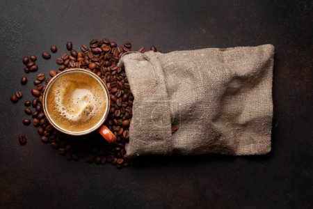 Photo for Fresh espresso coffee and roasted coffee beans in bag. Top view flat lay - Royalty Free Image