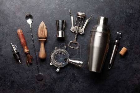 Photo for Various cocktail utensil set. Shaker, strainer, juicer. Top view flat lay - Royalty Free Image