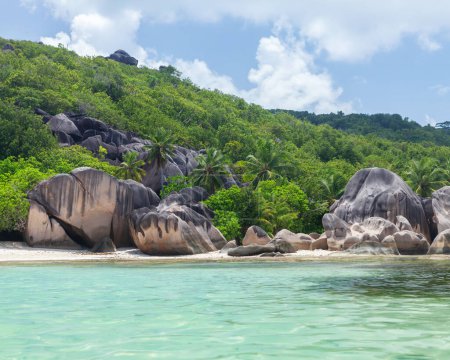 Photo for Seychelles beautiful tropical beach with palm trees, rocks and turquoise sea - Royalty Free Image
