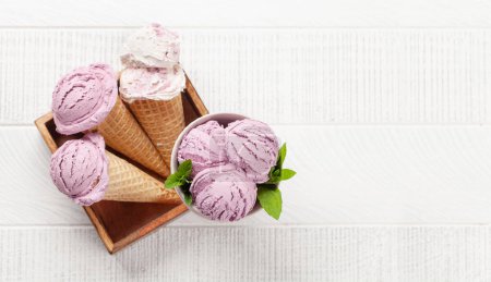 Photo for Various ice cream sundae in waffle cones. Top view flat lay with copy space - Royalty Free Image