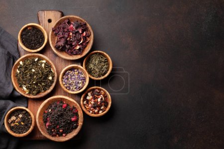 Photo for Various dried tea. Herbal, berry, green and black tea leaves. Top view flat lay with copy space - Royalty Free Image