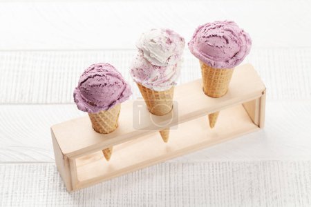 Photo for Various ice cream sundae in waffle cones - Royalty Free Image