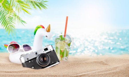 Photo for Retro camera and mojito cocktail on tropical beach with palms and bright sand. Summer sea vacation and travel concept with copy space - Royalty Free Image