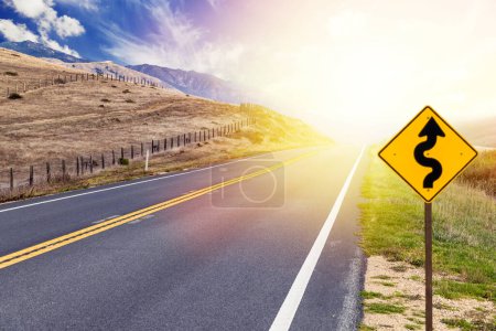 Photo for Asphalt road, road sign and country landscape with sunny sky. California State Route One - Royalty Free Image