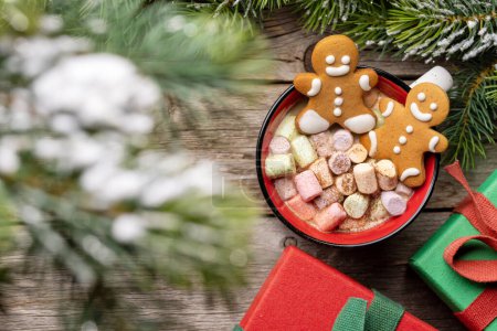 Photo for Gingerbread man cookies in a cup with marshmallow. Christmas holiday with copy space - Royalty Free Image