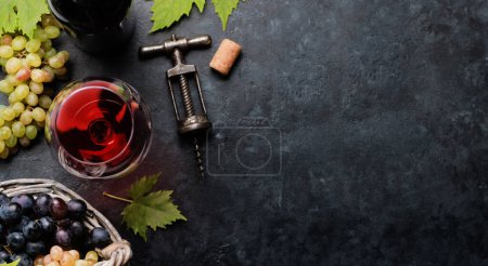 Photo for Red wine glass and grape in basket. Flat lay with copy space - Royalty Free Image