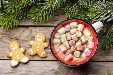 Photo for Gingerbread man cookies and a cup with marshmallow. Christmas holiday - Royalty Free Image