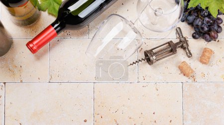 Photo for Wine glasses, bottles and grapes. Flat lay with copy space - Royalty Free Image