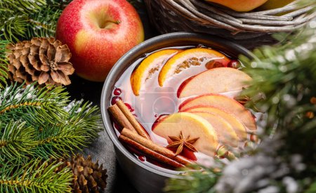 Photo for Hot mulled wine with fruits and spices - Royalty Free Image