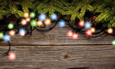 Foto de Fondo de Navidad, mesa de madera con árbol de Navidad decorado y guirnaldas. Piso con espacio de copia - Imagen libre de derechos
