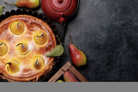 Photo for Homemade pear pie. Fruit tart with seasonal fruits. Flat lay with copy space - Royalty Free Image