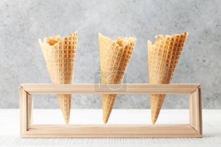 Photo for Three empty ice cream waffle cones - Royalty Free Image