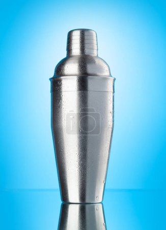 Photo for Cocktail shaker on blue background - Royalty Free Image