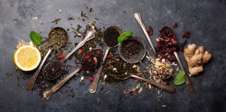 Photo for Various dried tea in spoons. Top view flat lay with space for your text - Royalty Free Image