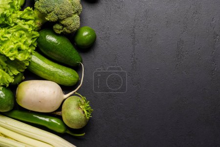 Photo for Healthy green vegetables and fruits. Flat lay with copy space - Royalty Free Image