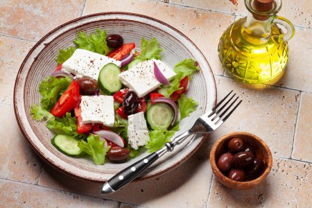 Photo for Greek salad with fresh vegetables and feta cheese - Royalty Free Image