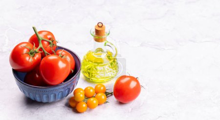Photo for Fresh garden vegetables. Tomatoes and olive oil. Italian cuisine. With copy space - Royalty Free Image
