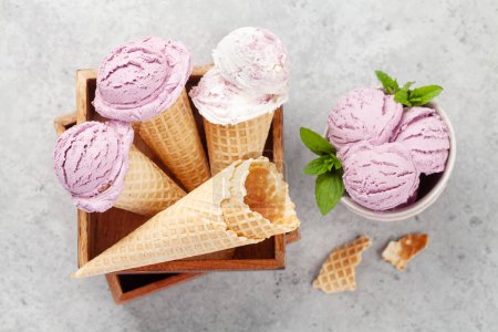 Photo for Berry ice cream sundae in waffle cones. Flat lay - Royalty Free Image