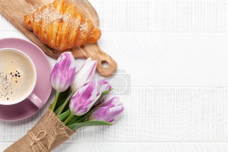 Photo for Croissant, coffee and tulip bouquet. French breakfast. Top view flat lay with copy space - Royalty Free Image