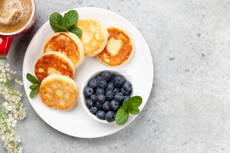 Photo for Cottage pancakes with berries. Breakfast with coffee. Top view flat lay with copy space - Royalty Free Image