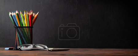Photo for Colorful pencils and blackboard for copy space. School and education template - Royalty Free Image