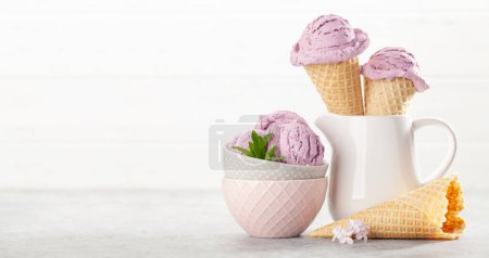 Photo for Berry ice cream sundae in waffle cones and copy space - Royalty Free Image