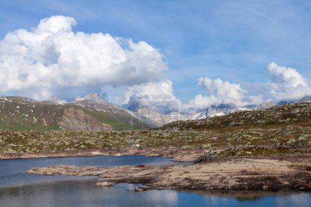 Photo for Panoramic view of lake in the Alps mountains with snow in Switzerland - Royalty Free Image