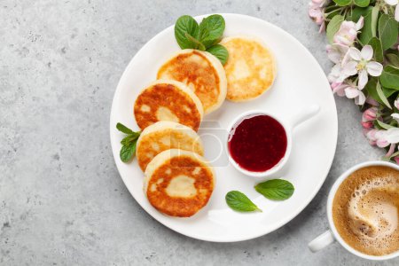 Photo for Cottage pancakes with berry jam. Breakfast with coffee. Top view flat lay with copy space - Royalty Free Image