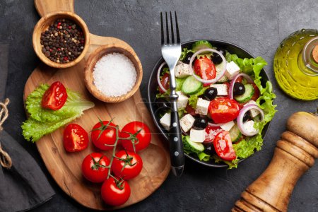 Photo for Classic greek salad with fresh garden vegetables. Top view flat lay - Royalty Free Image