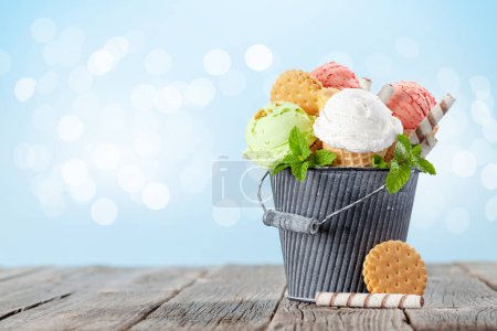 Photo for Various ice cream in waffle cones. Strawberry, pistachio and vanilla icecream. With copy space - Royalty Free Image