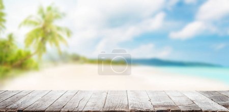 Photo for Empty wooden table or pier with sunny beach and sea on background. With copy space for your product - Royalty Free Image