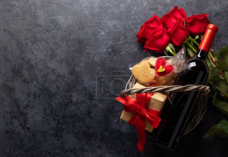 Photo for Valentines day card with wine bottle, heart shaped cookies, rose flowers and space for your greetings - Royalty Free Image