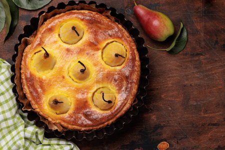 Photo for Homemade pear pie. Fruit tart with seasonal fruits. Flat lay with copy space - Royalty Free Image