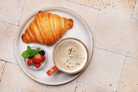 Photo for Coffee cup, berries and croissant. Flat lay with copy space - Royalty Free Image