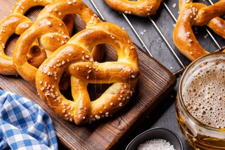 Photo for Freshly baked homemade pretzels and draft beer - Royalty Free Image
