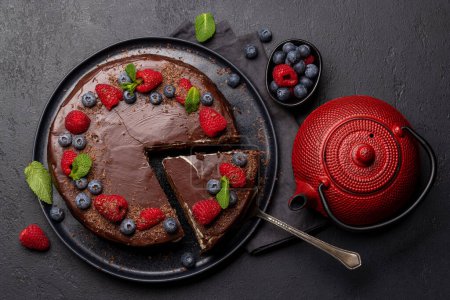 Photo for Chocolate cake dessert with fresh berries. Flat lay - Royalty Free Image
