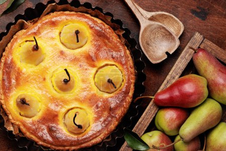 Photo for Homemade pear pie. Fruit tart with seasonal fruits. Flat lay - Royalty Free Image