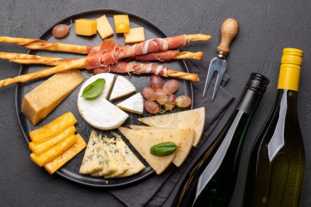 Photo for Antipasto board with various cheese and snacks. Flat lay - Royalty Free Image