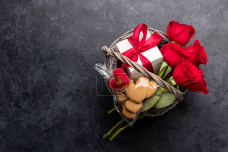 Photo for Valentines day card with heart shaped cookies, rose flowers and gift box. Flat lay with copy space - Royalty Free Image