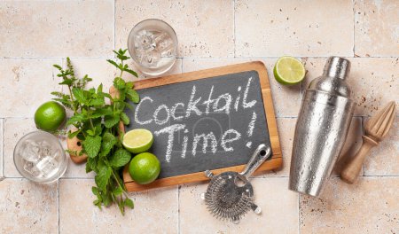Photo for Mojito cocktail ingredients and drinks utensils. On stone table flat lay - Royalty Free Image